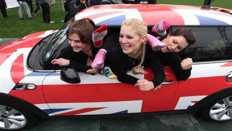 A new Mini record set as 28 gymnasts cram into one tiny car